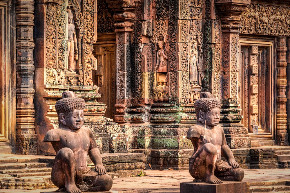 Intricate Hindu bas relief carvings on the stone walls of Angkor Wat