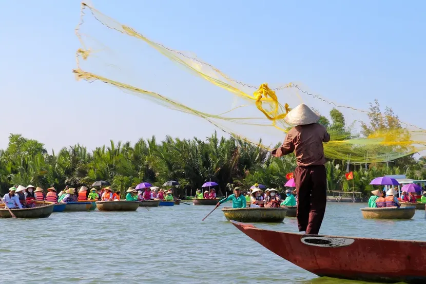 trawling fish net in hoi an coconut forest