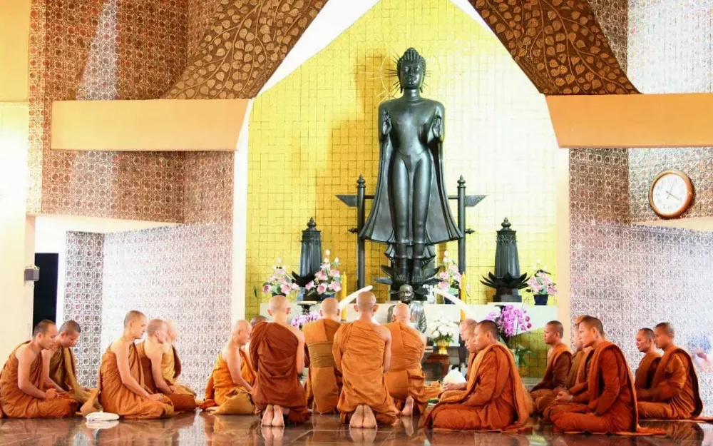 monks in orange during the festival in Laos