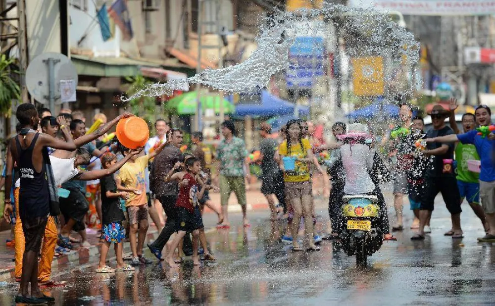 Locals and tourists enjoying a lively traditional Laos festival