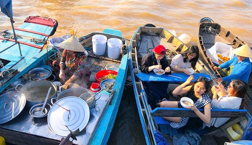 Bustling Cai Rang floating Market in Mekong Delta