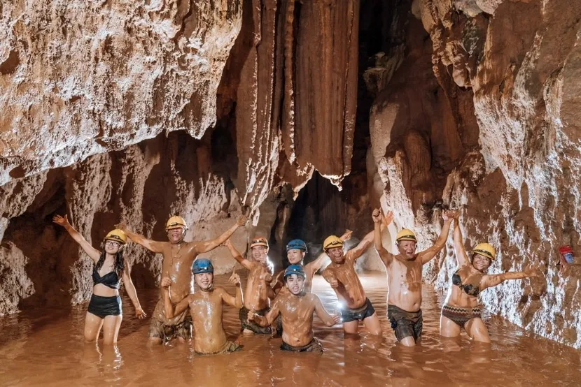 mud bathing in dark cave