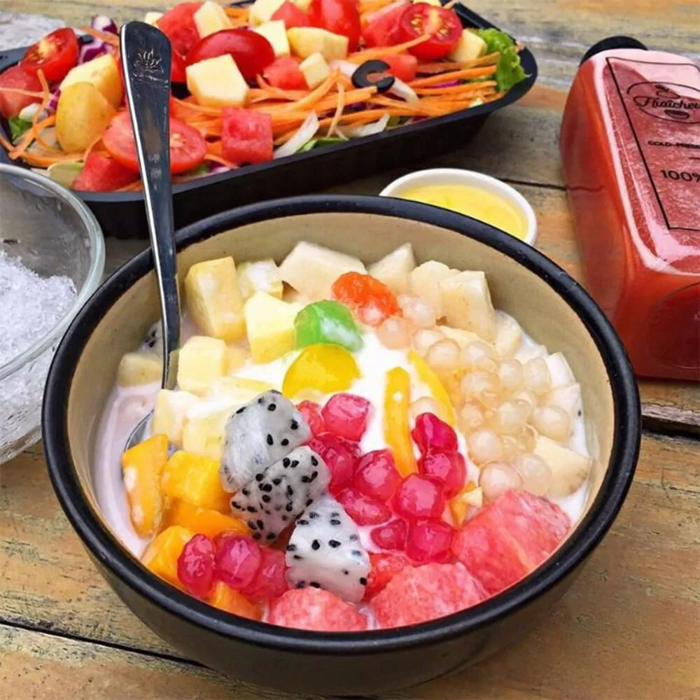 Las famosas frutas mixtas con leche condensada