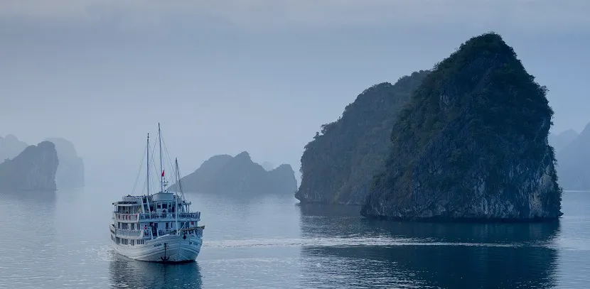 halong bay cruise in foggy day