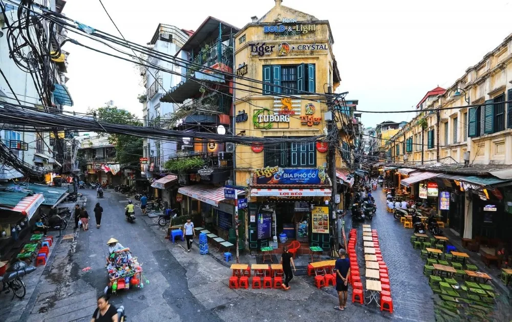 bustling Hanoi Old Quarter with ancient houses