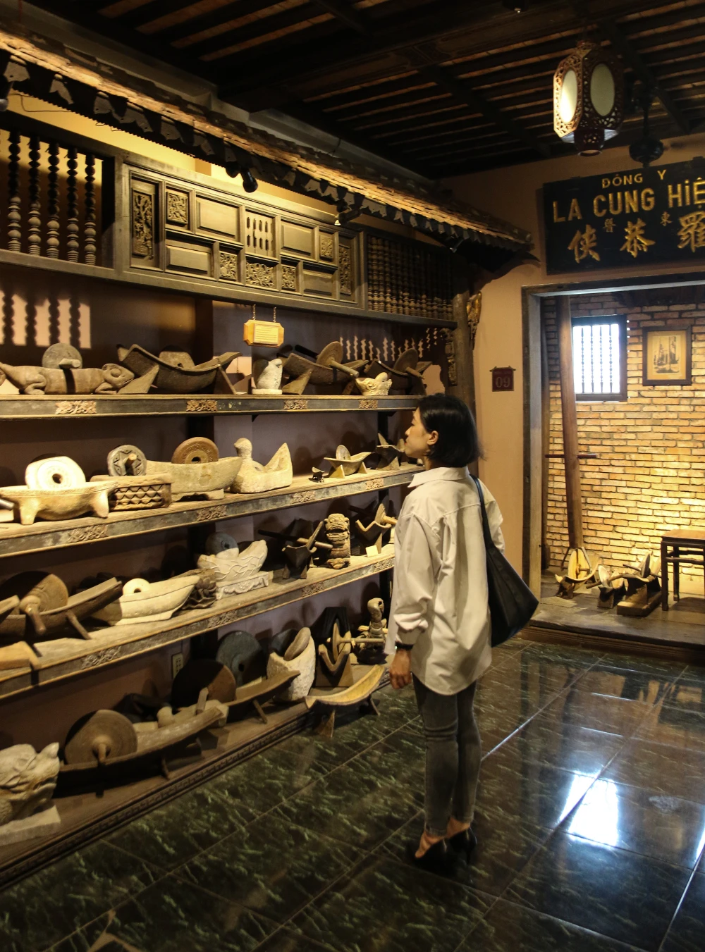 Collection of ancient Vietnamese ceramic pots for storing herbal remedies at FITO Museum