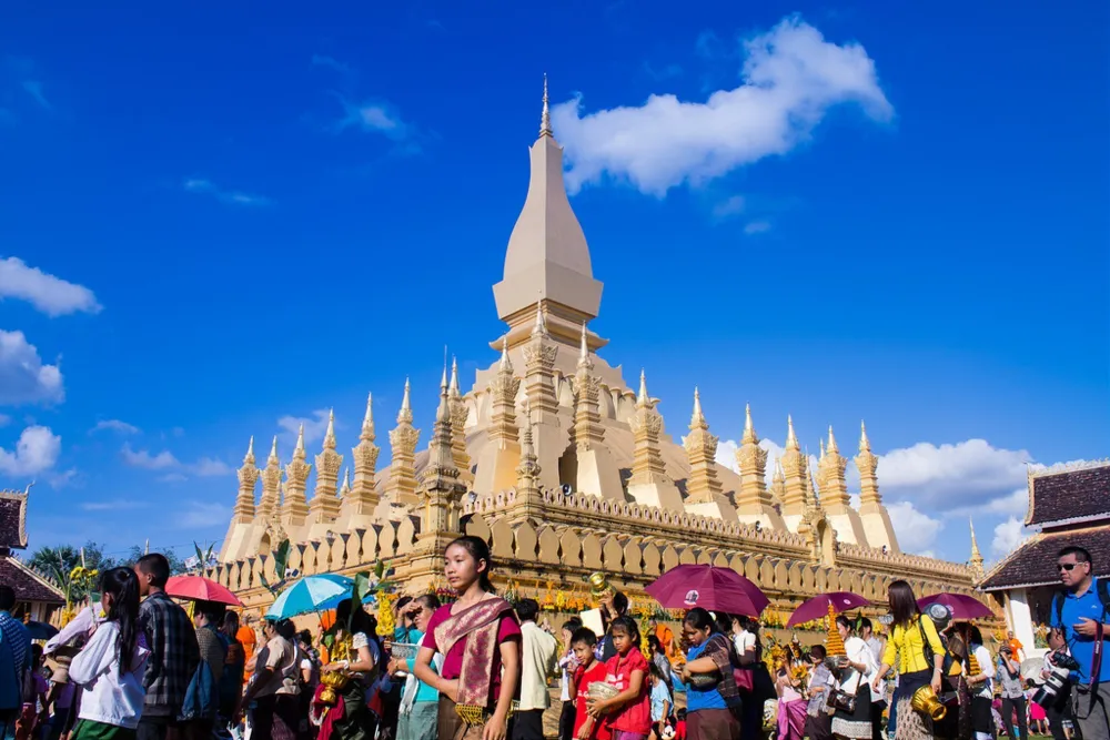 local and tourists participating in That Luang festival