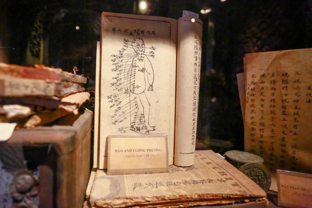 Ancient Vietnamese medical manuscripts written in Han and Nom characters displayed at FITO Museum