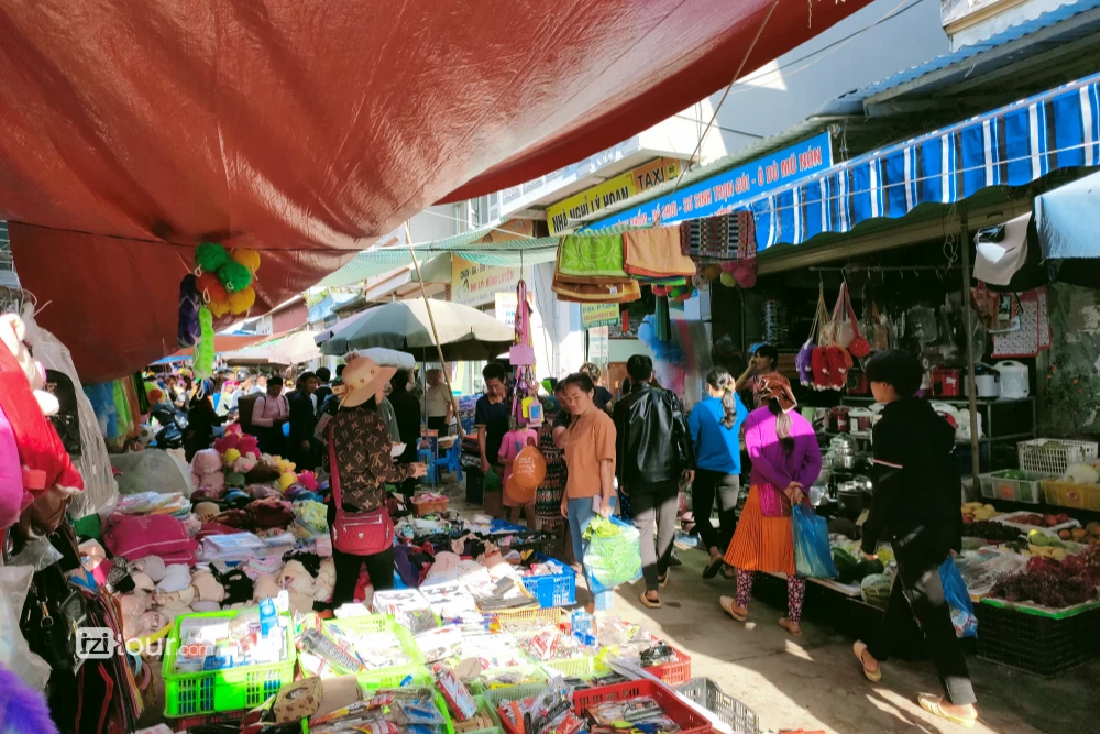 The bustling Dong Van Market nestled amidst the dramatic karst plateau landscapes of Ha Giang province