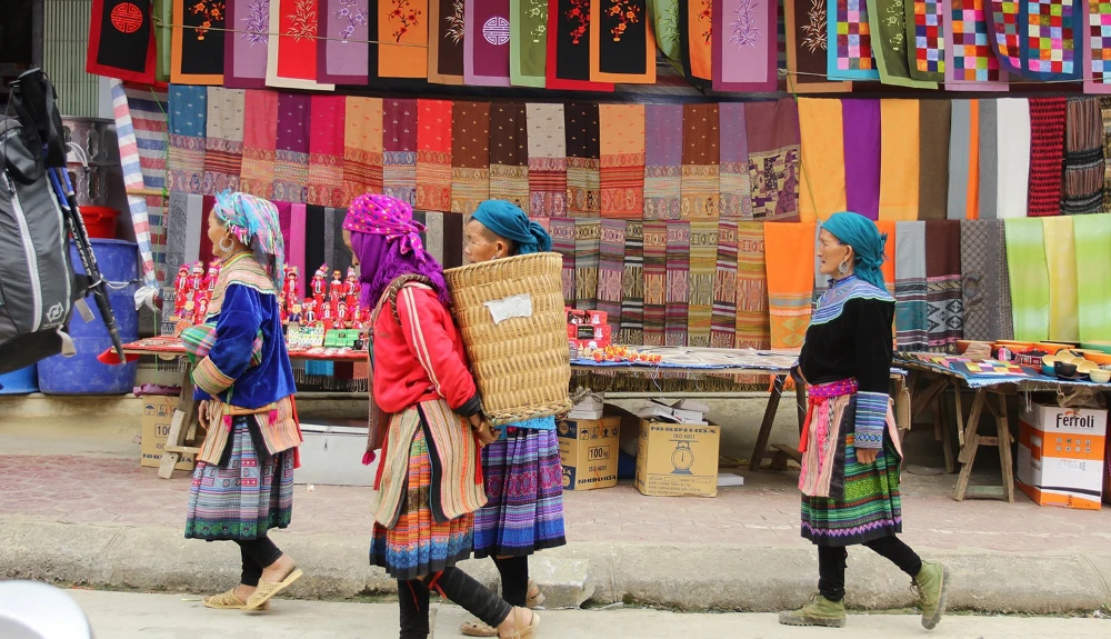 Vibrant ethnic markets in Vietnam northern mountains with locals gathering in colourful traditional costumes