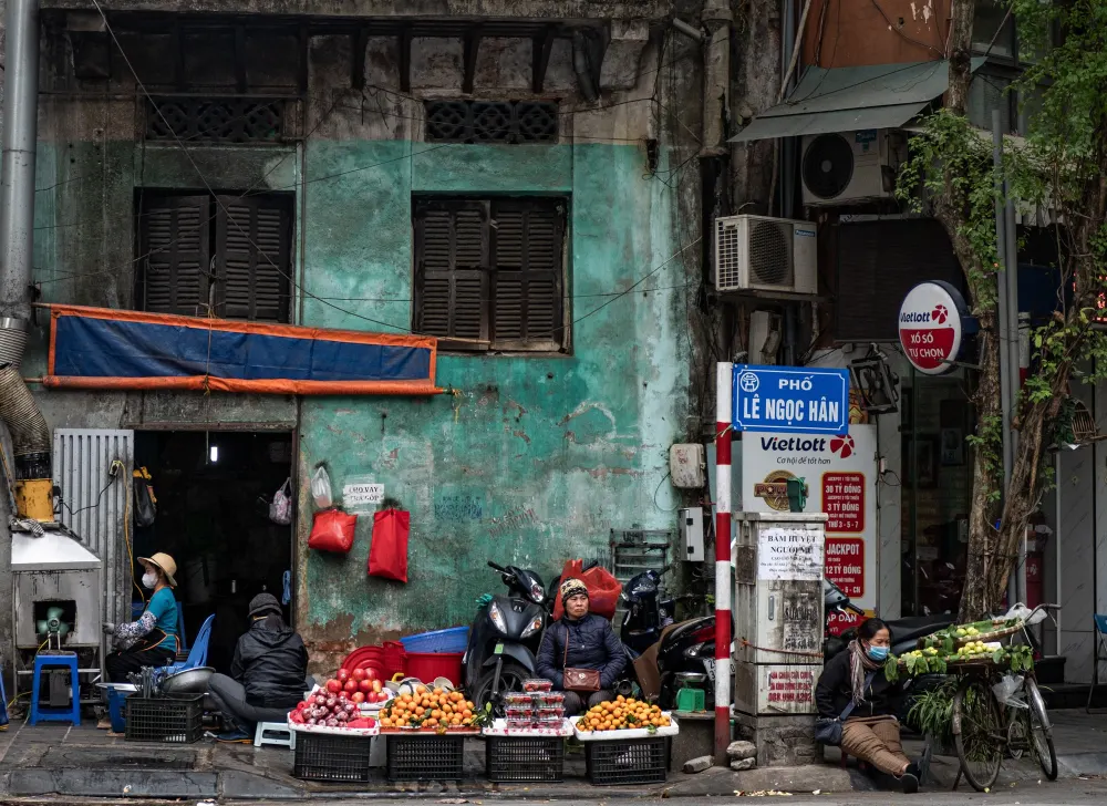 Hanoi shopping streets bustling with local residents and vendors