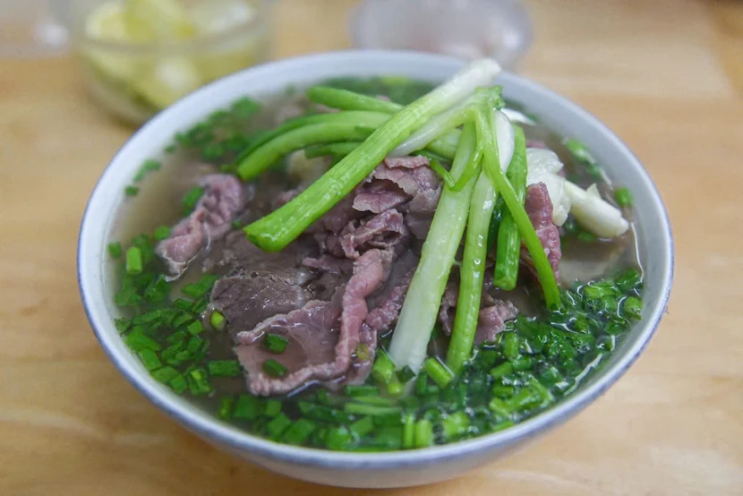 a bowl of beef pho hanoi