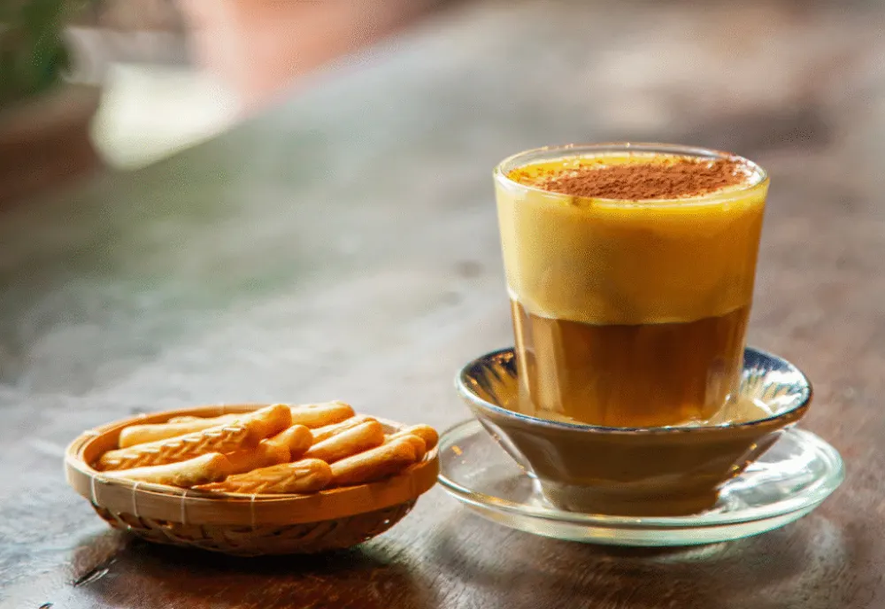 Vietnamese egg coffee served in a traditional Hanoi caf&eacute;
