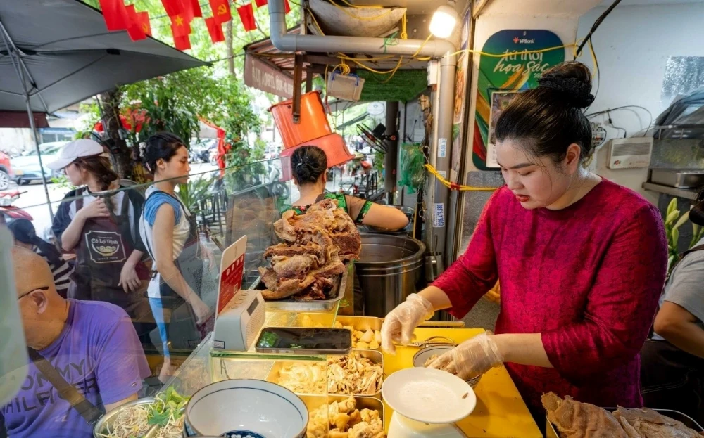 a local street food stall in the imperial city of Hue