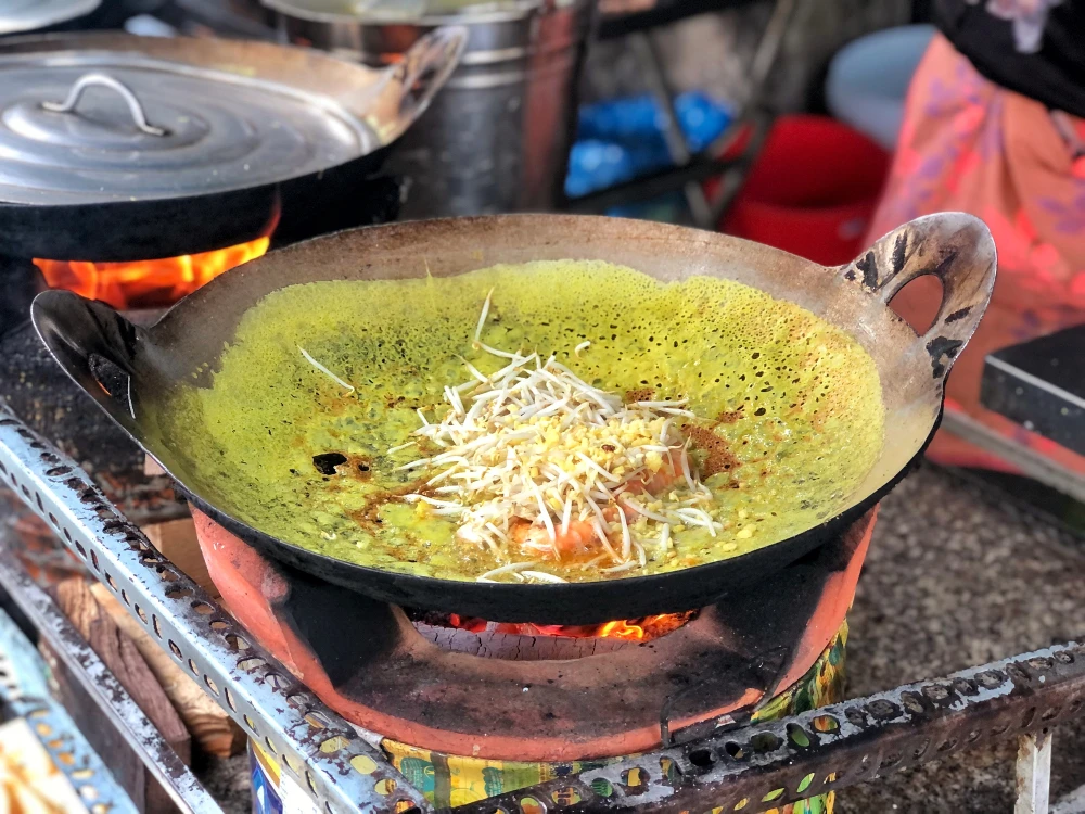 Southern Vietnamese crispy pancake with shrimp, pork, and bean sprouts