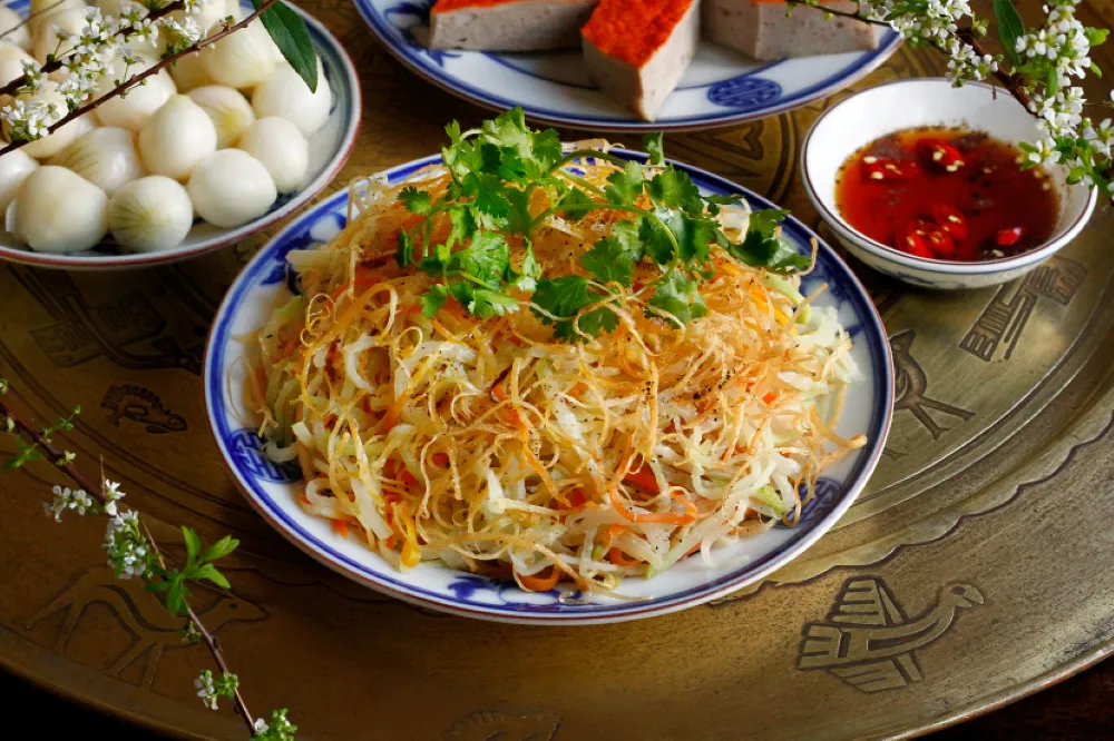 Rape saltate in padella con calamari - gastronomia di Bat Trang