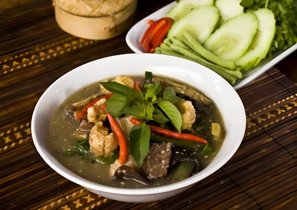 Or Lam the spicy traditional Lao stew from Luang Prabang with vegetables, meat