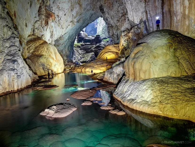 inside Son Doong Cave the world’s largest cave, featuring towering limestone walls
