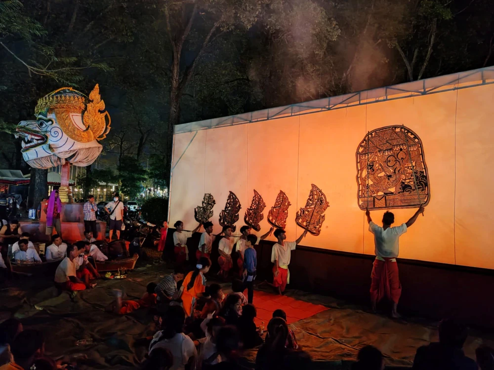 Tourists watching a cultural Khmer shadow theatre show