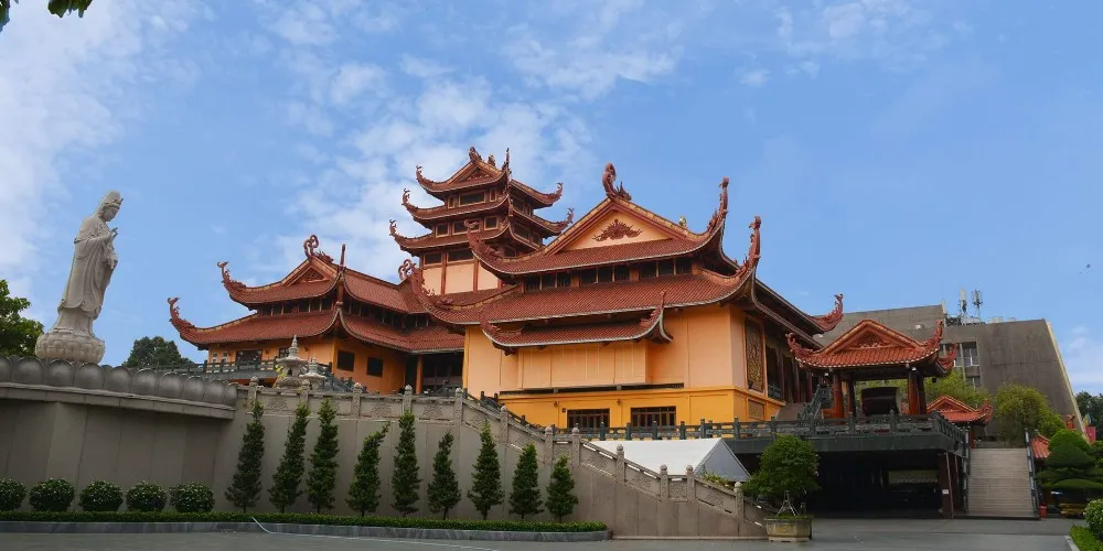 modern Buddhist temple with tall tower in ho chi minh city