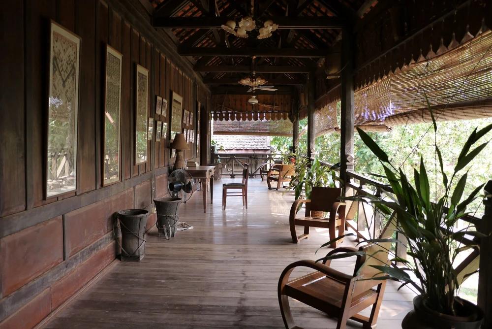 Intricate hand woven silk fabrics and traditional looms at the Lao Textile Museum